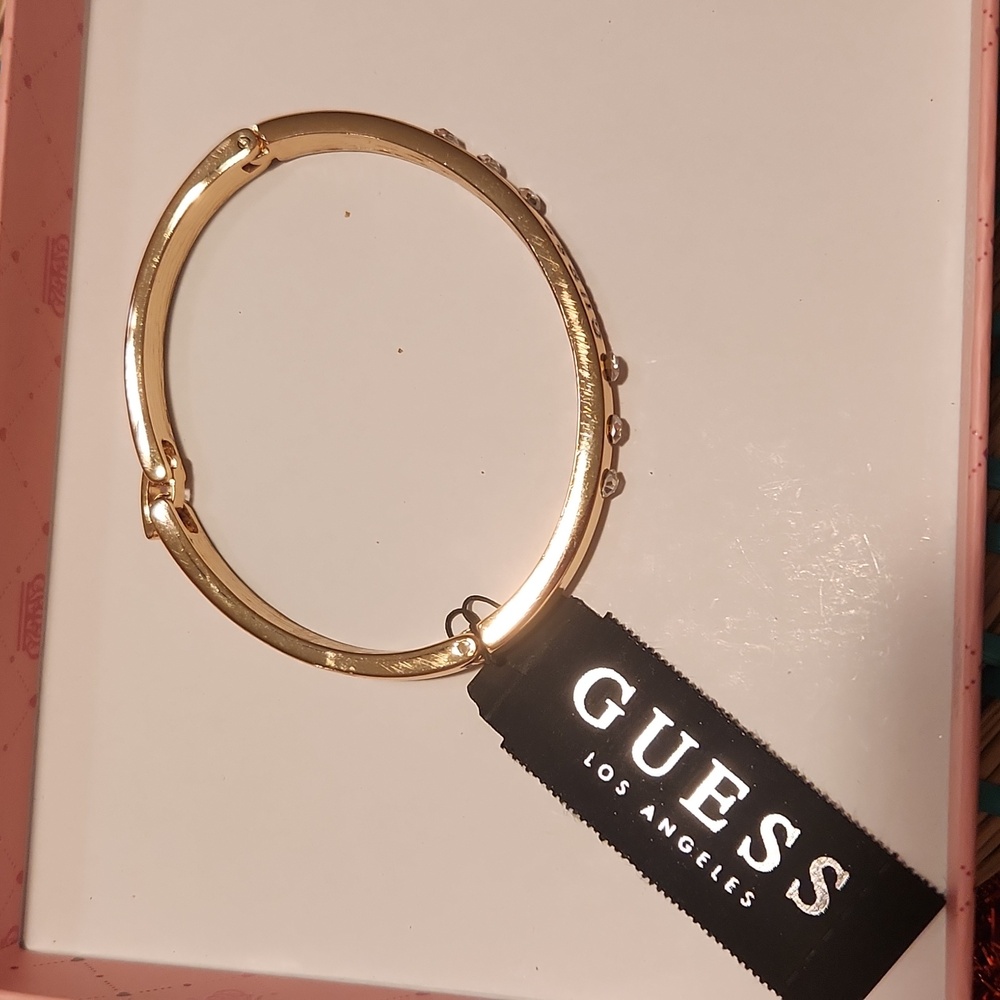 GUESS Gold Bracelet with Clear Stones Logo Accent - Picture 3 of 16